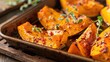 Roasted butternut squash halves with herbs. Close-up culinary photography.
