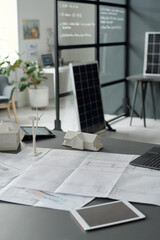 Aufkleber - Digital tablets, mockups of windmill and houses, unrolled blueprint with sketch of new construction on desk standing against office interior