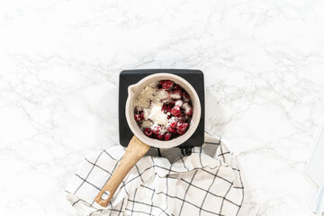 Sticker - Simmering Sweetness - Raspberry Cake Filling in Saucepan