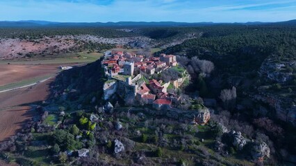 Wall Mural - Aerial view from a drone of the medieval town of Calatañazor. Municipality of Calatañazor. Tierras del Burgo region. Province of Soria. Castile and Leon. Spain. Europe