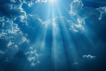 Poster - A clear sky dotted with fluffy white clouds. The sunlight filters through the clouds, casting a warm glow over the landscape. The scene radiates tranquility and serenity.