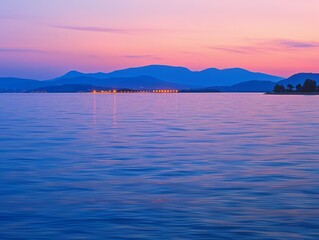 Wall Mural - A beautiful blue ocean with a mountain in the background