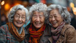 Cheerful, bright, fashionably dressed old women meet them together, communicate and laugh. Cheerful grandmothers. International Day of Older Persons. World Grandparents Day. Copy space