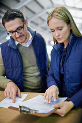 Aufkleber - Business people, reading and planning with checklist for inventory, storage or supply chain at warehouse. Happy coworkers, team or employees looking at documents, paperwork or distribution at factory
