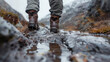 Men's boots while hiking in the mountains.
