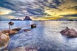 Idyllic shot of a golden-hued sunset over a tranquil body of water, Ibiza, Spain
