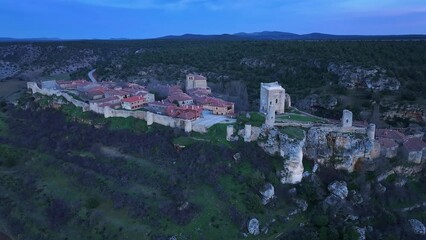 Wall Mural - Aerial view from a drone of the medieval town of Calatañazor. Municipality of Calatañazor. Tierras del Burgo region. Province of Soria. Castile and Leon. Spain. Europe