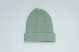Fototapeta Mapy - Mint green color Woolen warm winter hat on white background