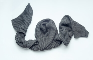 Wall Mural - Gray scarf on a white background. Top view