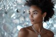 High-fashion editorial shot featuring a model adorned with elegant diamond jewelry, highlighting the brilliance and luxury of the diamonds against a sophisticated, minimalist backdrop.