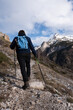 Hiker walking on the path in Pyrenees mountains near Gavarnie, High quality photo