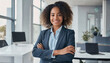 Young woman smiling, business professional ceo corporate leader, African American woman. Coworking