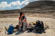 © Luis Herrera/Stocksy - young traveler woman