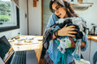 © Luis Herrera/Stocksy - woman at home office