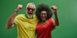 old man and old woman celebrating football victory. Studio shot