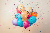 Fototapeta Panele - A dynamic explosion of colorful balloons and confetti on a light background