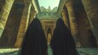 Two Women in Black Robes in Ancient Building