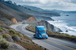 Blue semi truck driving along a scenic coastal highway with ocean views