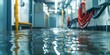 Mopping up flooded electrical room with deep water blurred cables Water damage from snowmelt or burst pipe. Concept Water Damage Restoration, Flooded Electrical Room, Snowmelt Incident