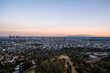 © Bisual Studio/Stocksy - Los Angeles skyline at sunset
