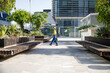 © Jovo Jovanovic/Stocksy - Entrepreneur walking in office premises on sunny day