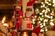 © Raymond Forbes LLC/Stocksy - Nutcracker Toys during Christmas Eve  decor with fire