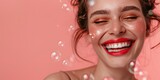 Fototapeta Kwiaty - Joyful woman with red lips and soap bubbles