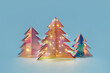 © Yaroslav Danylchenko/Stocksy - Holiday set of Christmas trees handmade of trendy holographic foil