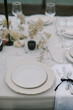 © Serena Burroughs/Stocksy - decorated event dinner table in late october