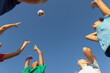 © Camelia Elisabeta Utalea/Stocksy - children's soccer game on a beach at sunset