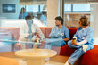 © BONNINSTUDIO/Stocksy - Healthcare workers taking a break sitting on sofa