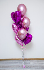 Wall Mural - bunch of pink balloons on a white background, hearts balloons