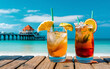 Concept of luxury vacation cuba libre cocktail on the pier long island ice tea cocktail on the pier tropical vacation background beach party clear blue sky horizontal wide screen format toned