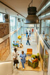 © BONNINSTUDIO/Stocksy - Medical workers and patients in hospital hall