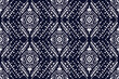 © digital Nomader - seamless ethnic pattern, monotone style with ikat hand drawing for printing business.