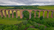 AERIAL: Beautiful overview of impressive Nairn Viaduct over wide green valley