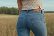 © polack - Sexy ass in jeans, sexy clothes ass in pants. Sexy woman wearing of jean pants from back