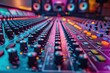 Audio Mixing Console with Blue and Orange Lights in the Background