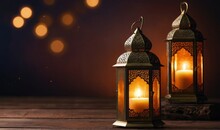 Modern Islamic holiday banner suitable for Ramadan, Raya Hari, Eid al-Adha and Mawlid. A lit lantern on an evening background