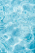 Abstract rippling water texture in cool tones