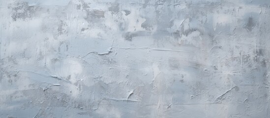 Poster - A fluid winter sky creates a freezing backdrop behind a closeup of a gray concrete wall. The transparent material contrasts with the snowy scene in a circular pattern