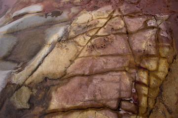 Wall Mural - texture and Rocks and sea landscape along the shore at  Porto Ferro, SS, Sardinia. Italy