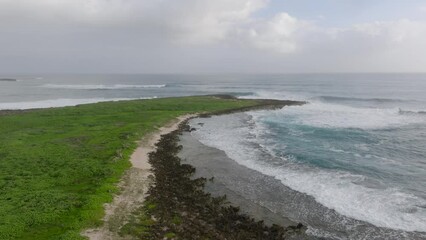 Wall Mural - crashing waves on small island 