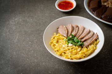 Sticker - dried duck noodles in white bowl