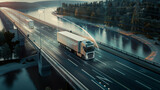 Fototapeta Paryż - A pristine white truck cruises down a highway, with a tranquil river flowing alongside under a clear blue sky