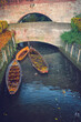 Wooden boats on the Danube river in the historic old town, Fishermen's Quarter (Fischerviertel) in Ulm, Germany