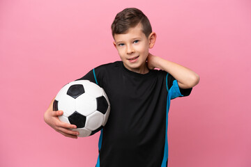 Wall Mural - Little caucasian football player boy isolated on pink background laughing