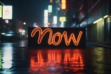 Fototapeta  - Slogan now neon light sign text effect on a rainy night street, horizontal composition