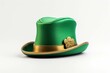 A leprechaun hat with a bright green color and a golden buckle, standing out against a white background