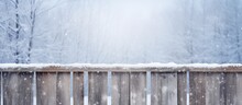 Wooden Fence In A Snowy Winter Scene With Snowflakes Falling Gently, Creating A Serene Background For Various Concepts Or Projects